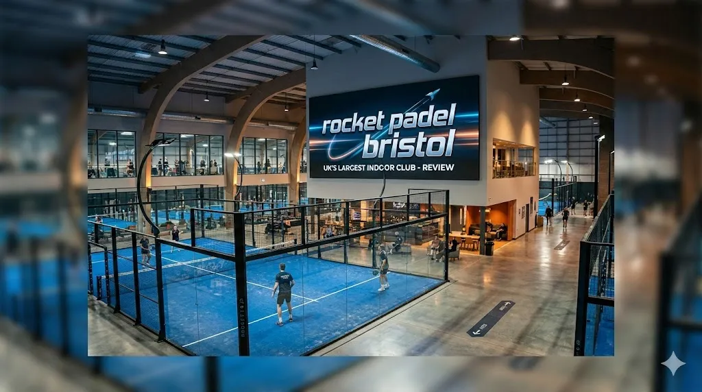 Interior view of the courts at Rocket Padel Bristol featuring blue turf and high ceilings, showcasing the UK's largest indoor padel club facility